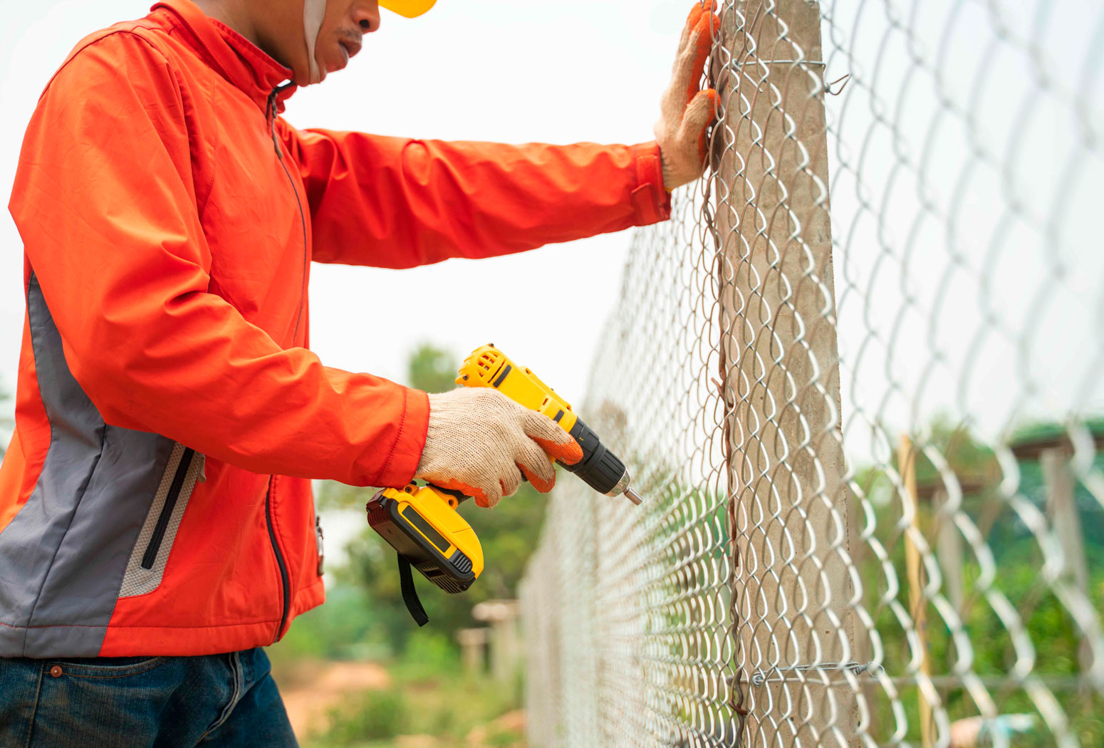 Friendly Earth team completing a high-quality fence project in Calgary.