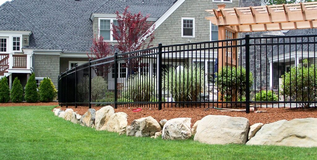 Durable residential fence designed by Friendly Earth Fence Contractors Calgary.