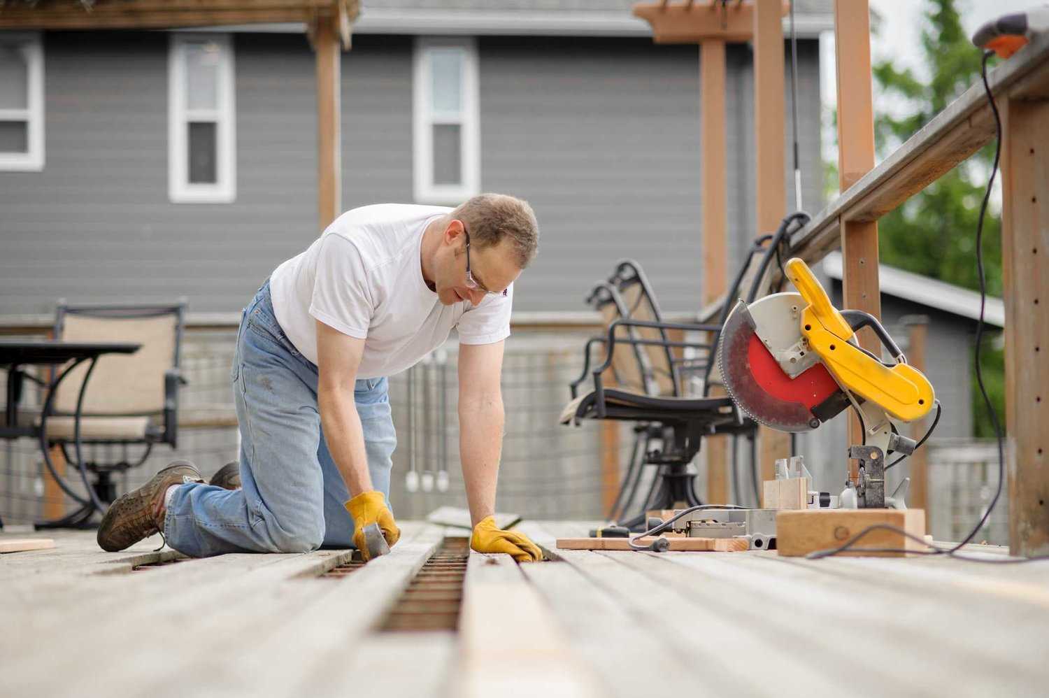 Professional deck contractors in Calgary building a custom outdoor deck with high-quality materials by Friendly Earth