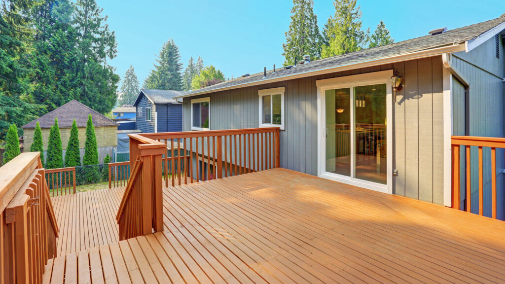 Professional deck contractors in Calgary building a custom outdoor deck with high-quality materials by Friendly Earth