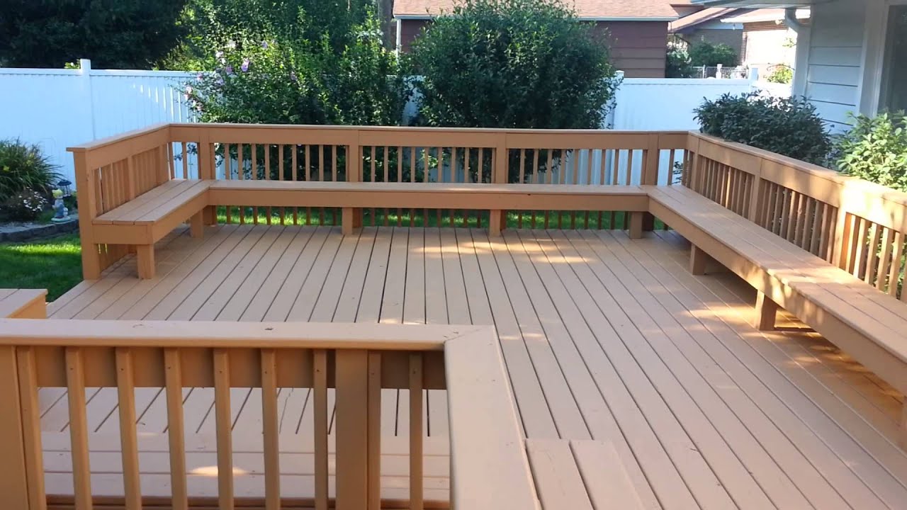 Professional deck contractors in Calgary building a custom outdoor deck with high-quality materials by Friendly Earth